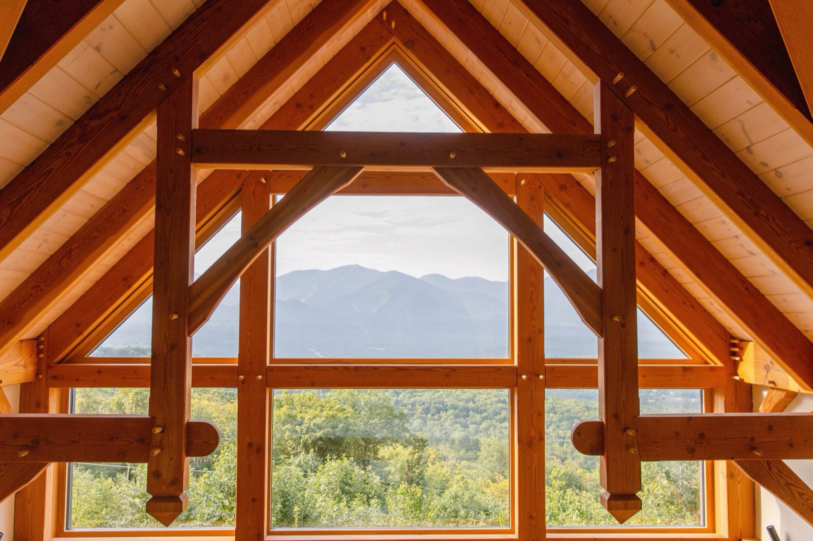 Atmospheric timber-frame interior used as concept imagery